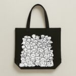 The "Meow Mob" Monochrome Doodle | Premium Black Canvas Tote bag