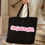 The "I'm Just A Girl" Viral Trend | Premium Black Canvas Tote bag - Image 4