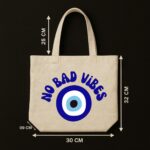 The "Evil Eye" Protector | Premium Off-White Canvas Tote bag - Image 5